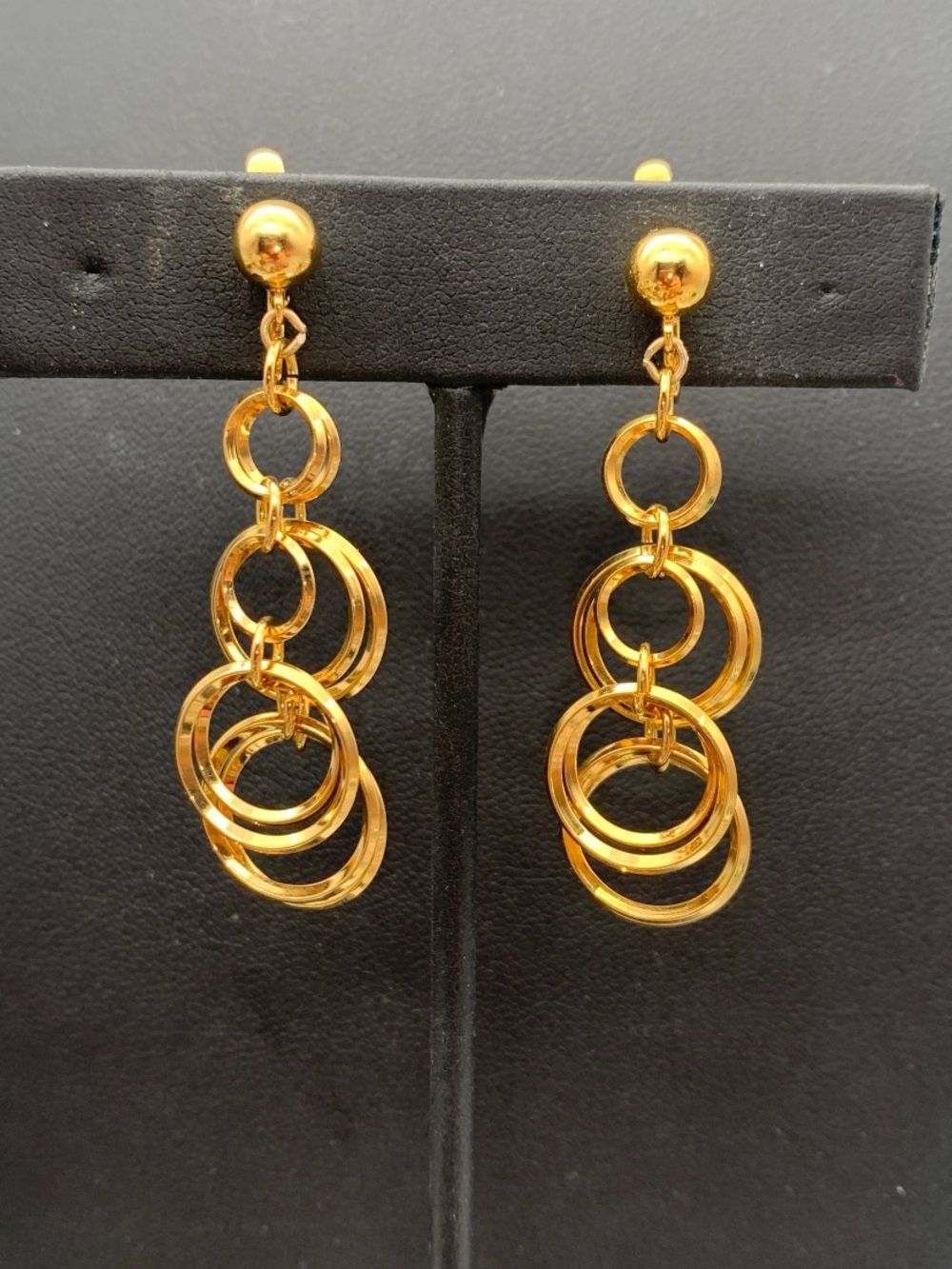 Vintage Trifari Gold tone Multi-Ring Dangle clip on Earrings - Classic Jewelry
